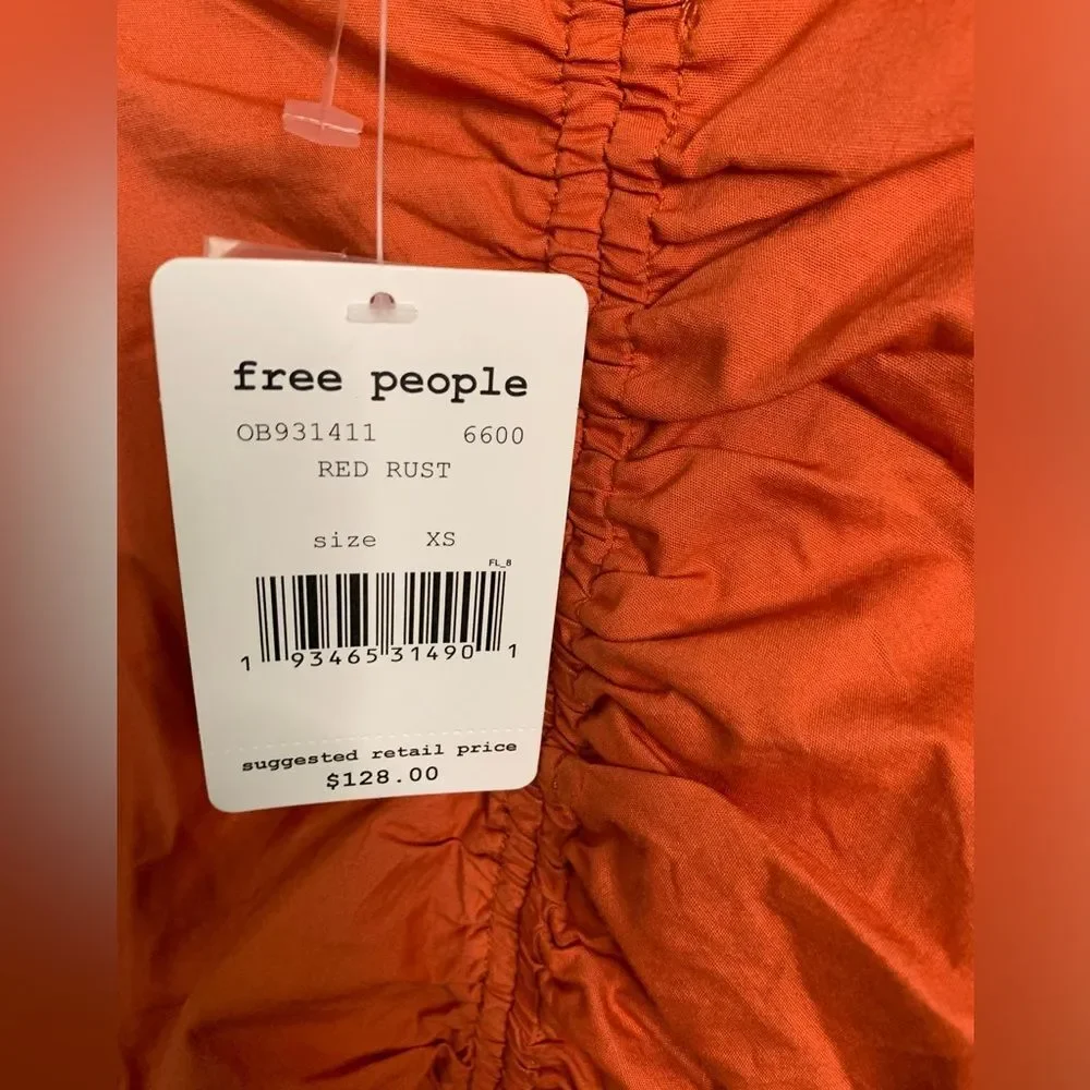 NWT Free People Women's Hold On Mini Dress in color red rust. Size XSmall